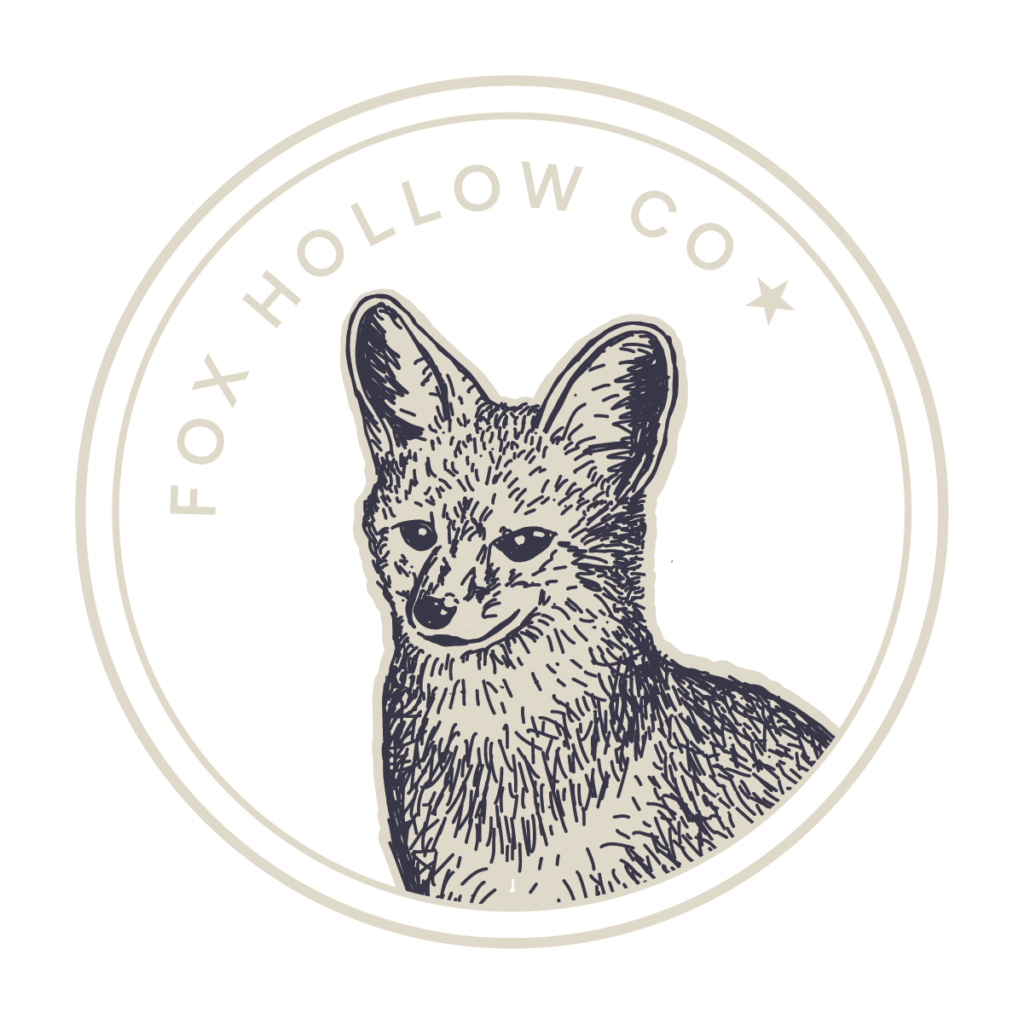 Fox Hollow Badge Logo in linen color.